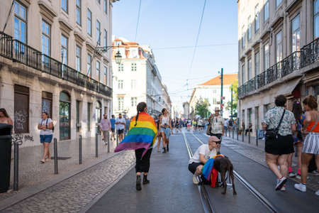 Lisbon, Portugal 17 June 2023 Crowds gather in Lisbon to celebrate the LGBT gay parade, showcasing vibrant rainbow flags, music, and community spirit.のeditorial素材