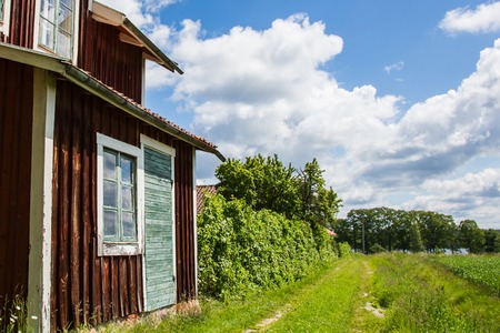 View of an Old Village in Sweden With a Blue Cloudy Skyのeditorial素材