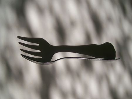 Reflection of a forkの写真素材