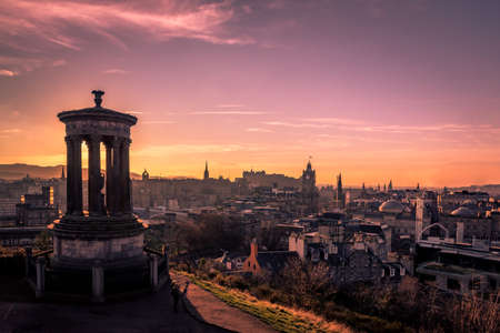 EDINBURGH, SCOTLAND DECEMBER 14, 2018: Beautiful sunset at the Dugald Stewart Monument in the...