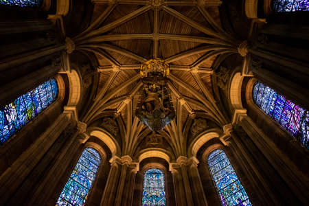 EDINBURGH, SCOTLAND, DECEMBER 15, 2018: Bottom view of the dome of the Scottish National War Memorial, with an oak carving of St. Michael surrounded by beautiful stained glassesのeditorial素材