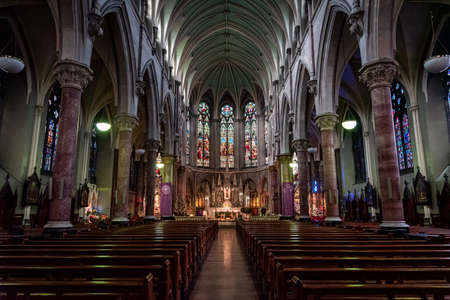 DUBLIN, IRELAND, DECEMBER 21, 2018: Interior of Church of St. Augustine and St. John, commonly known as John's Lane Church, a large Roman Catholic Church located on Thomas Streetのeditorial素材