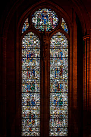 LIVERPOOL, ENGLAND, DECEMBER 27, 2018: Stained glass from interior of the Church of England Anglican Cathedral of the Diocese of Liverpool.のeditorial素材