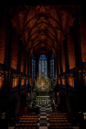 LIVERPOOL, ENGLAND, DECEMBER 27, 2018: The Lady Chapel in Liverpool Anglican Cathedral. Perspective view of a magnificent part inside the church, where light meets darkness all along placeのeditorial素材
