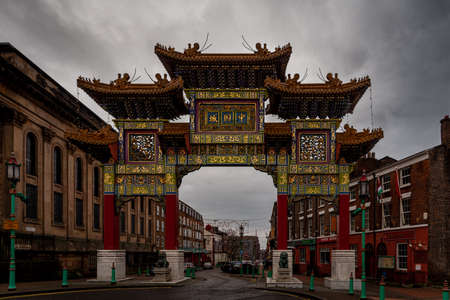 LIVERPOOL, ENGLAND, DECEMBER 27, 2018: View of the enormous chinatown gate in a cloudy and desolated day.のeditorial素材