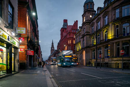 LIVERPOOL, ENGLAND, DECEMBER 27, 2018: City view of Liverpool streets with blurred double decker buses.のeditorial素材