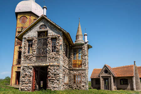 GONZALEZ CATAN, ARGENTINA, SEPTEMBER 28, 2019: Abandoned buildings in the amazing medieval town of Campanopolisのeditorial素材