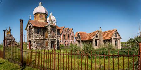GONZALEZ CATAN, ARGENTINA, SEPTEMBER 28, 2019: Abandoned buildings in the amazing medieval town of Campanopolisのeditorial素材