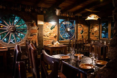 Interior of a beautiful and cozy irish pub, full of drinks, beers and food to spend a good timeの写真素材