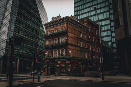 LONDON, ENGLAND, DECEMBER 29, 2018:The Albert public house in Westminster, surrounded by skyscrapers. A great mixture of old an modern architecture in a cosmopolitan cityのeditorial素材