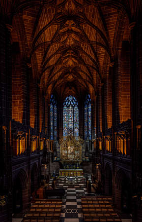LIVERPOOL, ENGLAND, DECEMBER 27, 2018: The Lady Chapel in Liverpool Anglican Cathedral. Perspective view of a magnificent part inside the church, where light meets darkness all along placeのeditorial素材