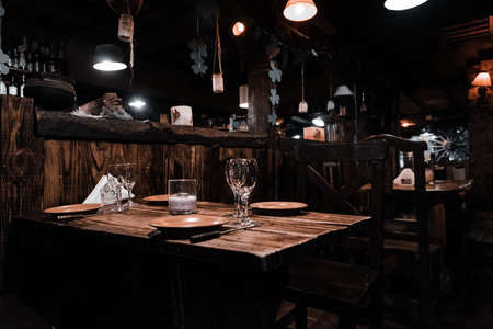 Interior of a beautiful and cozy irish pub, full of drinks, beers and food to spend a good time.