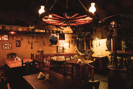 VILLA GESELL, ARGENTINA, NOVEMBER 14, 2019: Interior of a beautiful and cozy irish pub, full of drinks, beers and food to spend a good timeのeditorial素材