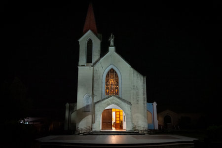 CORDOBA, ARGENTINA, APRIL 30, 2022: Nightscene of parish of Our Lady of Carmen in La Cumbre,...