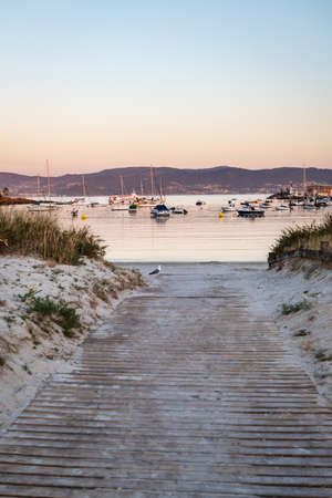 Vertical view of beach and sport port of Portonovo full of small motor boats, Portonovo, Spain.の写真素材