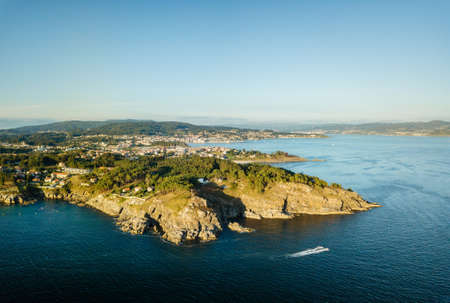 Aerial view of the Galician coast at the opening of the Ria de Pontevedra, were the Atlantic ocean...