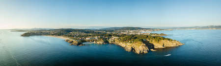 Aerial view of the Galician coast at the opening of the Ria de Pontevedra, were the Atlantic ocean meets the land.の写真素材