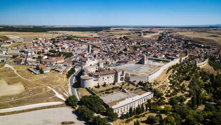 Aerial view of Cuellar, a small old town in the province of Segovia, with the reconstructed castle in the foreground.の写真素材