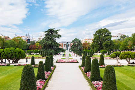 MADRID - SEPTEMBER 9, 2017: Tourists and locals walk around one of the main entrances to the Retiro...