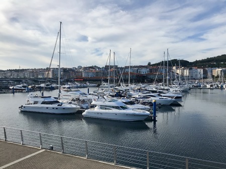 View of the harbour in Sanxenxo Galicia Spain during a sunny summer dayのeditorial素材