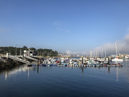View from the pier with boats at the distance in Sanxenxo Galicia Spain during a nice summer dayのeditorial素材