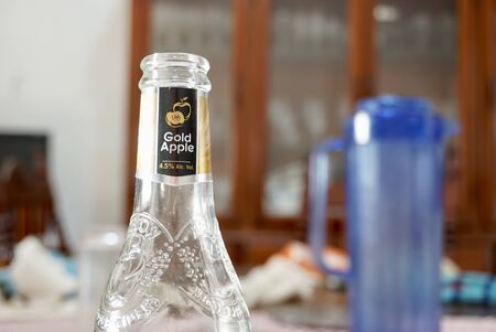 Puebla, Puebla / Mexico - December 24 2019: Editorial illustrative view of an empty cider bottle...