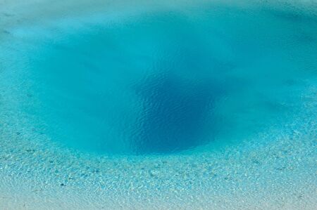 deep blue geyser at the Yellowstone National Parkの写真素材