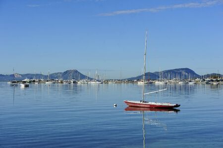sailboat on water near the coast in the harbor of Port de Pollenca  Puerto Pollensa , Mallorca, Spainの写真素材