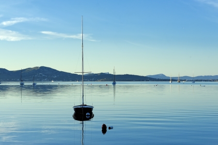 sailboat on water in the harbor of Port de Pollenca  Puerto Pollensa , Majorca, Spainの写真素材