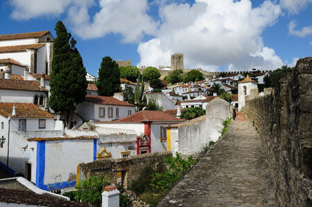 nice town within castle walls, Obidos, Portugalのeditorial素材