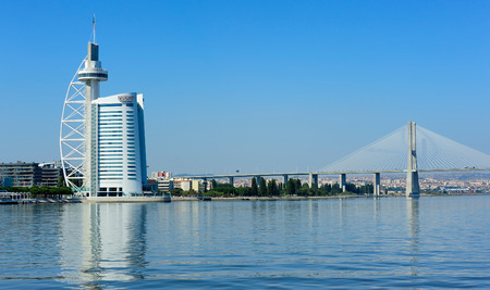 Vasco da Gama Bridge and Torre Vasco da Gama, Lisbon, Portugalのeditorial素材