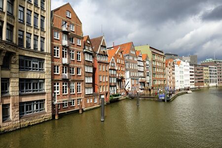 historic timber-framed houses at Nikolaifleet, Altstadt district, Hamburg, Germany. Nikolaifleet  separates the Cremon island from the mainland. The Nikolaifleet is one of the oldest parts of the port of Hamburg.のeditorial素材