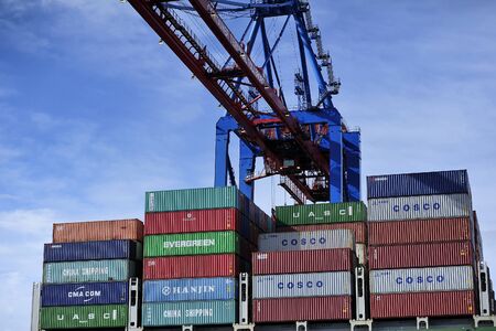 HAMBURG, GERMANY - MARCH 22, 2015: Container ship at the Port of Hamburg Hamburger Hafen is a German...