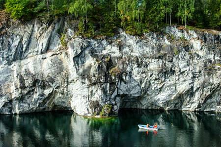 view of canyon and lake in abandoned marble quarry in the Ruskeala Mountain Park, Karelia, Russiaの写真素材