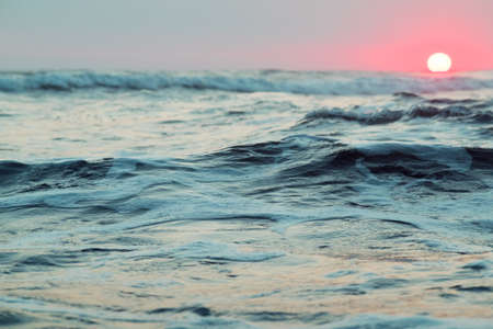 Sunset in the oceanの写真素材