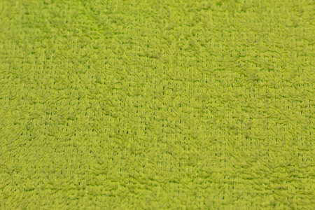 Texture of a clean green ragの写真素材