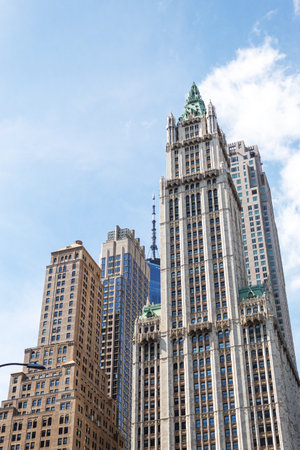 New York, United States - March 26, 2022: Skyscrapers seen from below with a clear sky in the background on a sunny dayのeditorial素材