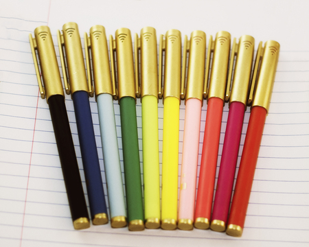 A rainbow of colored pens ready to go back to school, an office or create art.の写真素材