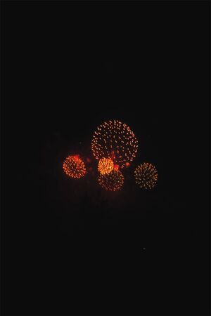 A colorful fireworks display in the night sky.の写真素材