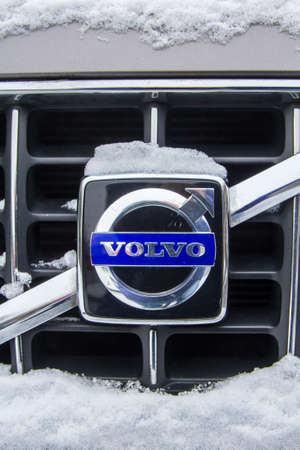 The Hague, the Netherlands - February 11, 2017: Volvo emblem covered in snow emblem