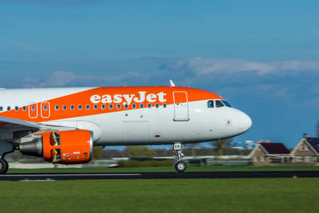 Amsterdam Schiphol Airport, the Netherlands - April 14, 2017: Easyjet aircraft landing at Amsterdam Schiphol Airportのeditorial素材
