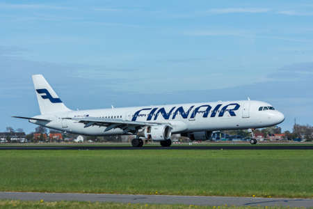 Amsterdam Schiphol Airport, the Netherlands - April 14, 2017:Finnair aircraft landing at Amsterdam Schiphol Airportのeditorial素材