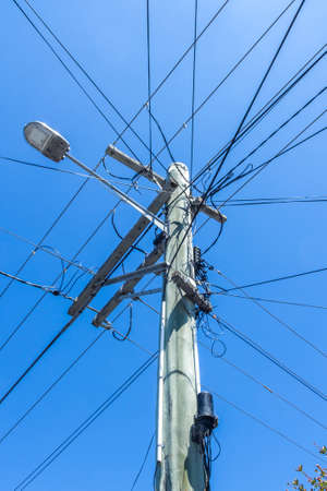 Hobart, Australia - 6 January 2017: urban street lamp post with wiresのeditorial素材