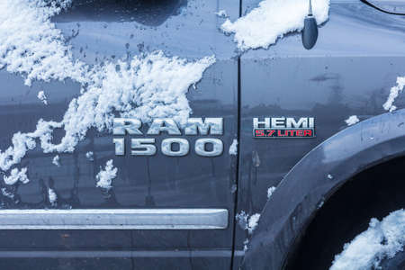 The Hague, the Netherlands - February 2 2018: sudden heavey snow makes driving conditions difficult Dodge vehicle covered in snowのeditorial素材