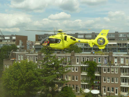 Rietland park, Amsterdam, the Netherlands -July 18 2018: emergency medical trauma helicopter lands in Amsterdam to attend victims of traffic accidentのeditorial素材