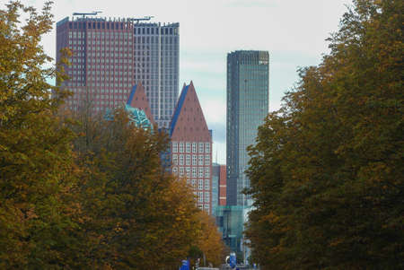 The Hague, the Netherlands - October 7 2018: view of The Hague city skyline modern buildings through treesのeditorial素材