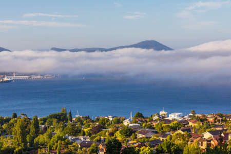 Hobart, Tasmania, Australia - December 24 2016: Hobart city and derwent river viewed from suburb of...