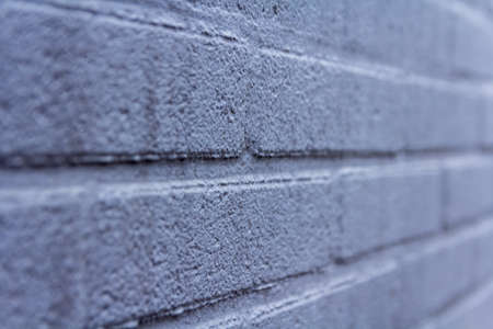 gray rustic texture, rogh texture stone block surface. uneven grungy square stone wall. background. abstract outdoor wall, thin depth of fieldの写真素材