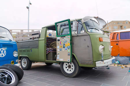 Scheveningen, The Hague, the Netherlands - 1960s style VW Kombi utility parked at Scheveningen beach