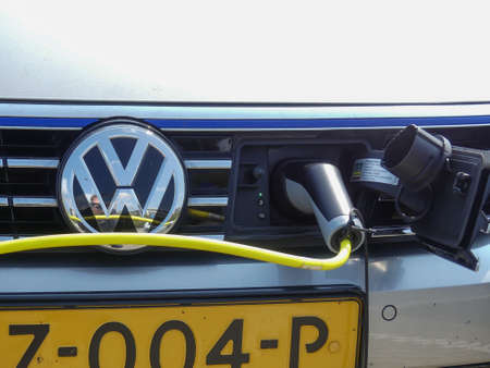 The Hague, the Netherlands - April 214 2019: VW electric hybric car charging at plug in stationのeditorial素材